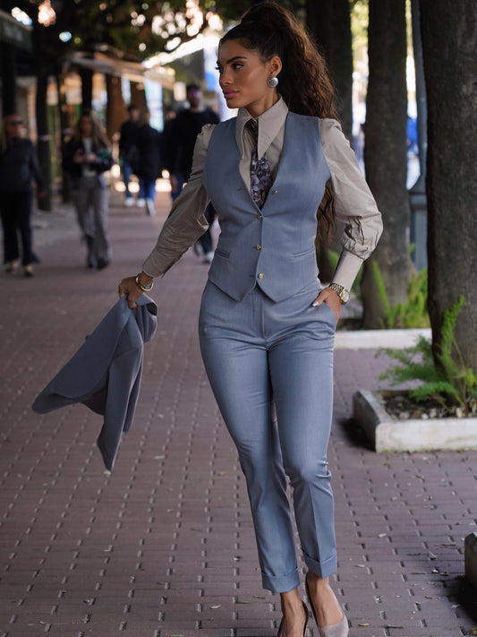 Gilet azzurro polvere monopetto con bottoni oro