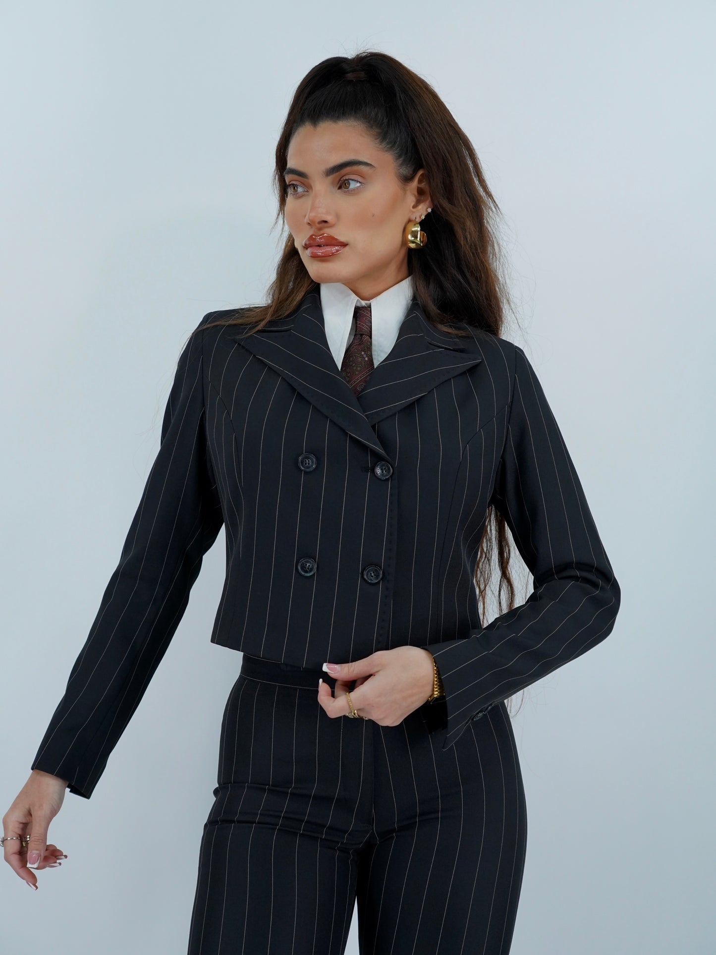 Giacca doppiopetto nero gessato .